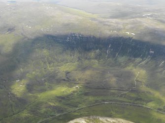 Oblique aerial view centred on the Dwarfie Stane chambered cairn, taken from the NW.