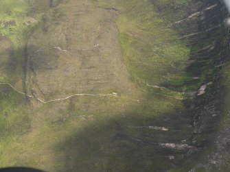 Oblique aerial view centred on the Dwarfie Stane chambered cairn, taken from the SW.
