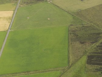 Oblique aerial view centred on the broch of Redland, taken from the S.