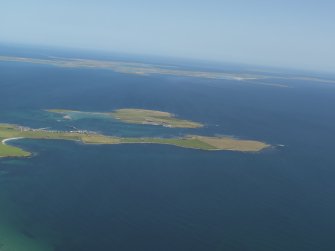 General oblique aerial view of the N of Stronsay with Papa Stronsay beyond, taken from the S.