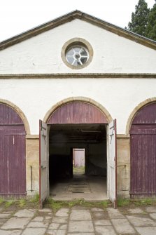 Detail of central arched opening with doors open