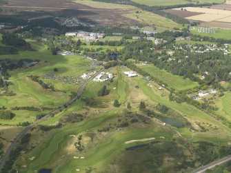 General oblique aerial view of Gleneagles Hotel and golf courses, taken from the SE.