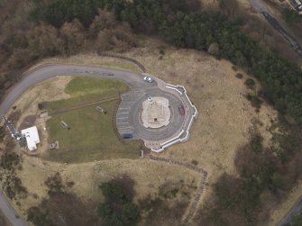 Oblique aerial view of the Dundee Law centred on the war memorial, taken from the W.