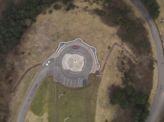 Oblique aerial view of the Dundee Law centred on the war memorial, taken from the N.