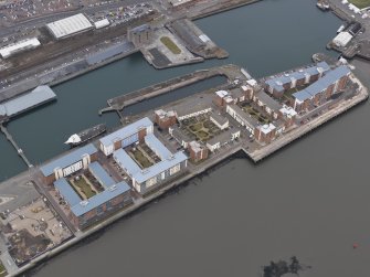 General oblique aerial view of the new development in Dundee harbour, taken from the SSW.