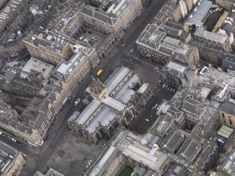 General oblique aerial view of Parliament Square centred on St Giles catherdral, taken from theSW.