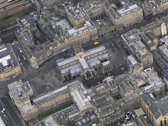 General oblique aerial view of Parliament Square centred on St Giles catherdral, taken from the S.
