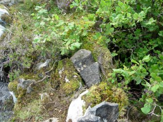 Broken millstone on top of Mill dam