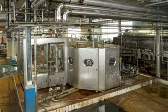 Bottling Plant. Interior. View  from south of Simon crowner and filler.