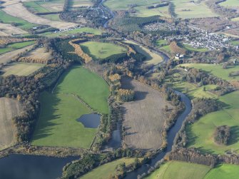 General oblique aerial view looking along the River Teith towards Doune Castle and village, taken from the SE.