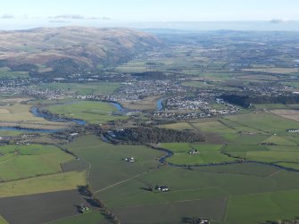 General oblique aerial looking towards The Ochils and The Wallace Monument, taken from the SW.