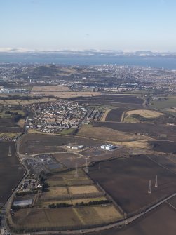 General oblique aerial view of Danderhall and Campend, looking NNW.