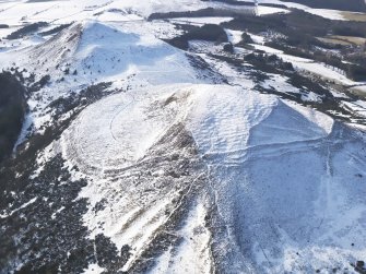 Oblique aerial view of Eildon Hill North fort.