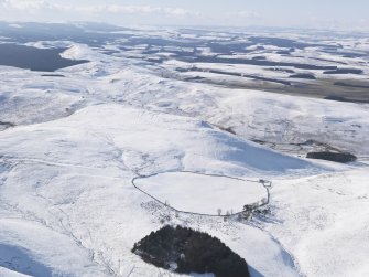 General  view of Woden Law fort and linear earthworks, and the Roman road in snow, looking WSW.
