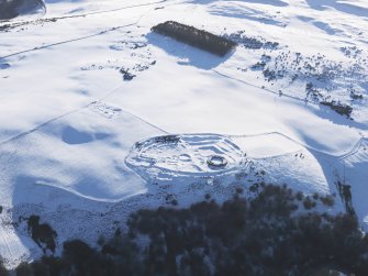 Oblique aerial view of Edin's Hall broch and fort, looking SW.