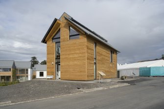 General view of Plot 14, The Skylight Home by Richard Murphy Architects, taken from the SW.