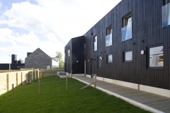 Rear view of Plot 1, Stealth Terrace by JM Architects, taken from the SW.