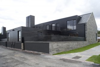 Rear view of Plot 2, The Stone House by NORD Architects, taken from the W.
