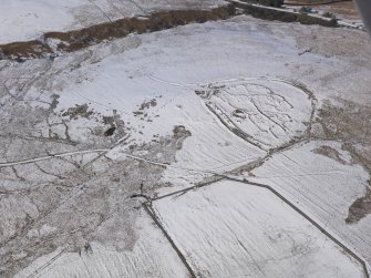 Oblique aerial view of the settlement and field system at Blakebillend, looking NNW.