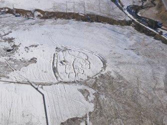 Oblique aerial view of the settlement and field system at Blakebillend, looking NW.