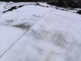 Oblique aerial view of the snow marks of the settlement at Black Loch, taken from the SE.