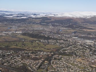 General oblique aerial view of Stirling, with the Wallace Monument beyond, looking N.