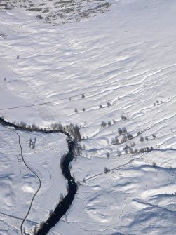 Oblique aerial view of the farmsteads, looking NE.