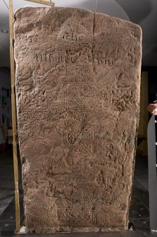 View of pictish cross slab (with scale)