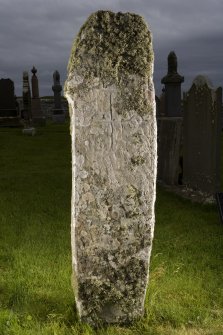 View of stone with carved cross (flash)