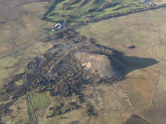 Oblique aerial view of the bing at Auchlochan Colliery, taken from the ESE.