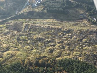 Oblique aerial view of the remains of the Wilsontown mine workings after clearance of trees, taken from the ENE.