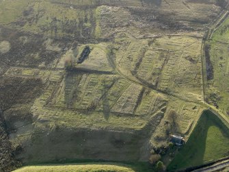 Oblique aerial view of the remains of the village of Haywood, taken from the NE.