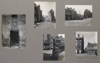 Card folder containing photographs of Candlemaker Row. Front cover has pencil notes describing the photographs inside. 
Edinburgh Photographic Society Survey of Edinburgh and District, Ward XIV George Square