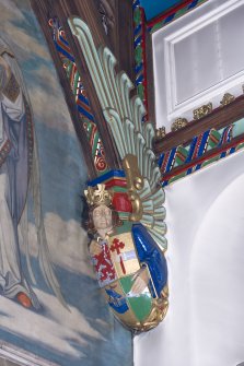 Interior. Nave, detail of angel at cornice level