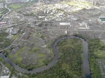 General oblique aerial view of the Dalmarnock-Dalbeth-Carmyle area of Glasgow and the construction of the Glasgow 2014 Commonwealth Games facilities, taken from the SSE.