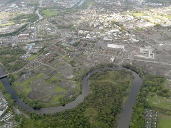 General oblique aerial view of the Dalmarnock-Dalbeth-Carmyle area of Glasgow and the construction of the Glasgow 2014 Commonwealth Games facilities, taken from the SE.