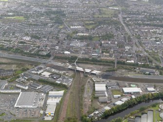 Oblique aerial view of the city showing the route of the M74 extension going through the Rutherglen area centred on Rutherglen railway station, taken from the N.