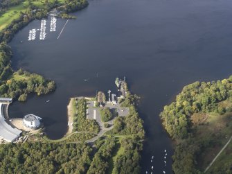 Oblique aerial view centred on the pier with the visitor centre adjacent, taken from the SE.