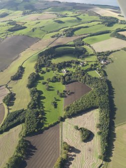Oblique aerial view centred on the policies and parkland of Mountquhanie House, taken from the E.