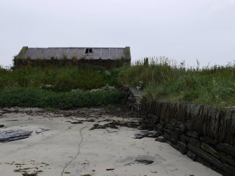 View of storehouse and S end of pier