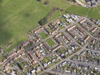 General oblique aerial view of Tillicoultry, centred on area between Jamieson Gardens and Walker Terrace, taken from the SW