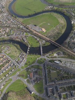 Oblique aerial view of the city, centred on the bridges across the River Forth at Causewayhead, taken from the WSW.
