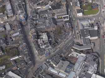 Oblique aerial view of the city centred on the Douglas Hotel, taken from the SSE.