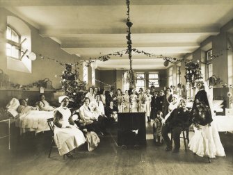 View of ward decorated for Christmas with patients and staff at Bruntsfield  Hospital.
Bruntsfield 1933, 
PHOTOGRAPH ALBUM No.174: Un-named album.