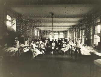 View of ward decorated for Christmas with patients and staff at Bruntsfield  Hospital.
Bruntsfield 1932, 
PHOTOGRAPH ALBUM No.174: Un-named album