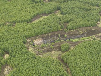 Oblique aerial view of the remains of Elrig Mhor Quarry, taken from the SSE.