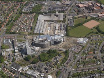 Oblique aerial view of the construction works at the Royal Victoria Hospital, Kirkcaldy, taken fromt he WSW.