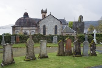 General view of St Munn's Church from the North (NNE). Also showing Argyll Mausoleum to the East and Collegiate Church of St Mun and Douglas of Glenfinart Mausoleum to the West.