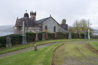 General view of St Munn's Church from the North-East. Also showing Argyll Mausoleum to the East and Collegiate Church of St Mun in the background to the West.