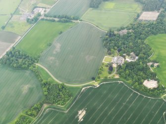 Oblique aerial view of the cropmarks and of Rankeilour Country House, looking WSW.